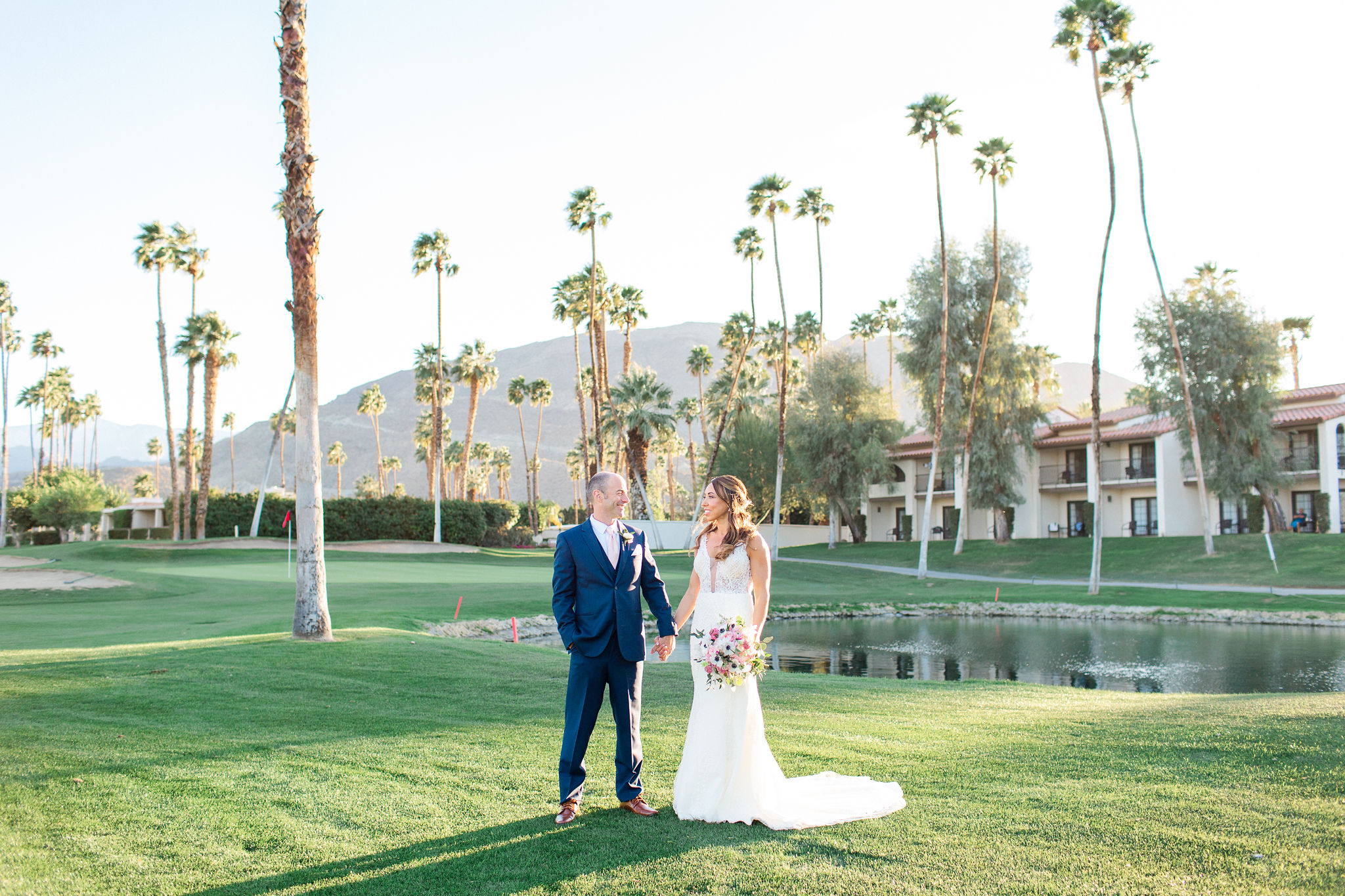 Bride and groom on golf course in Rancho Mirage